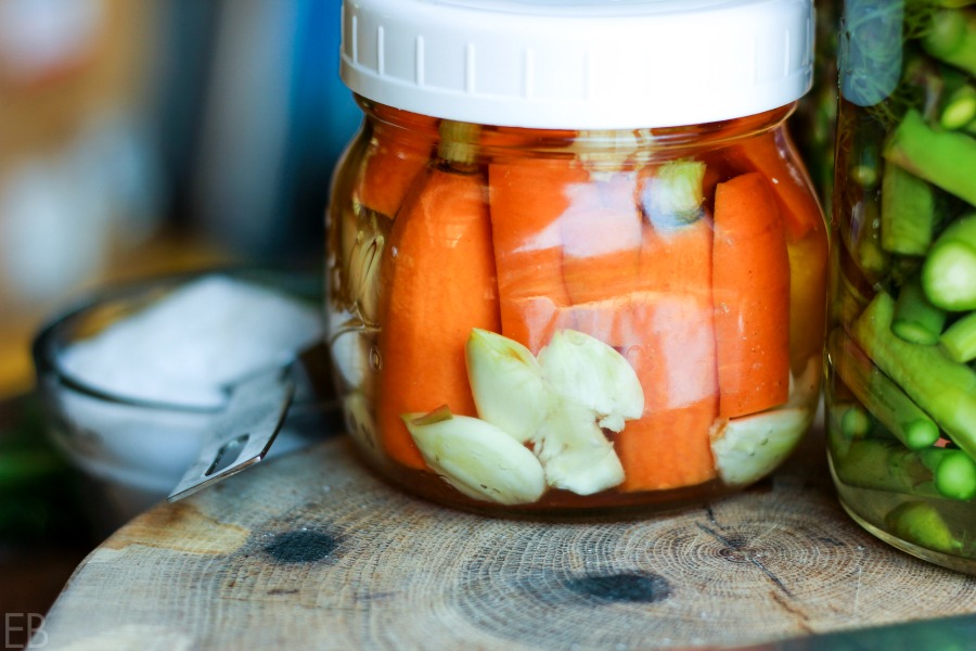 a jar of fermented carrots and garlic