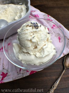 bowl of lavender honey paleo ice cream with pink fabric underneath and silver spoon