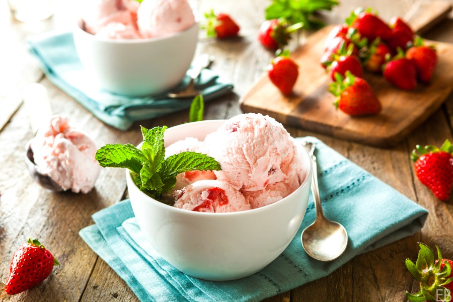 bowl of strawberry ice cream with fresh mint