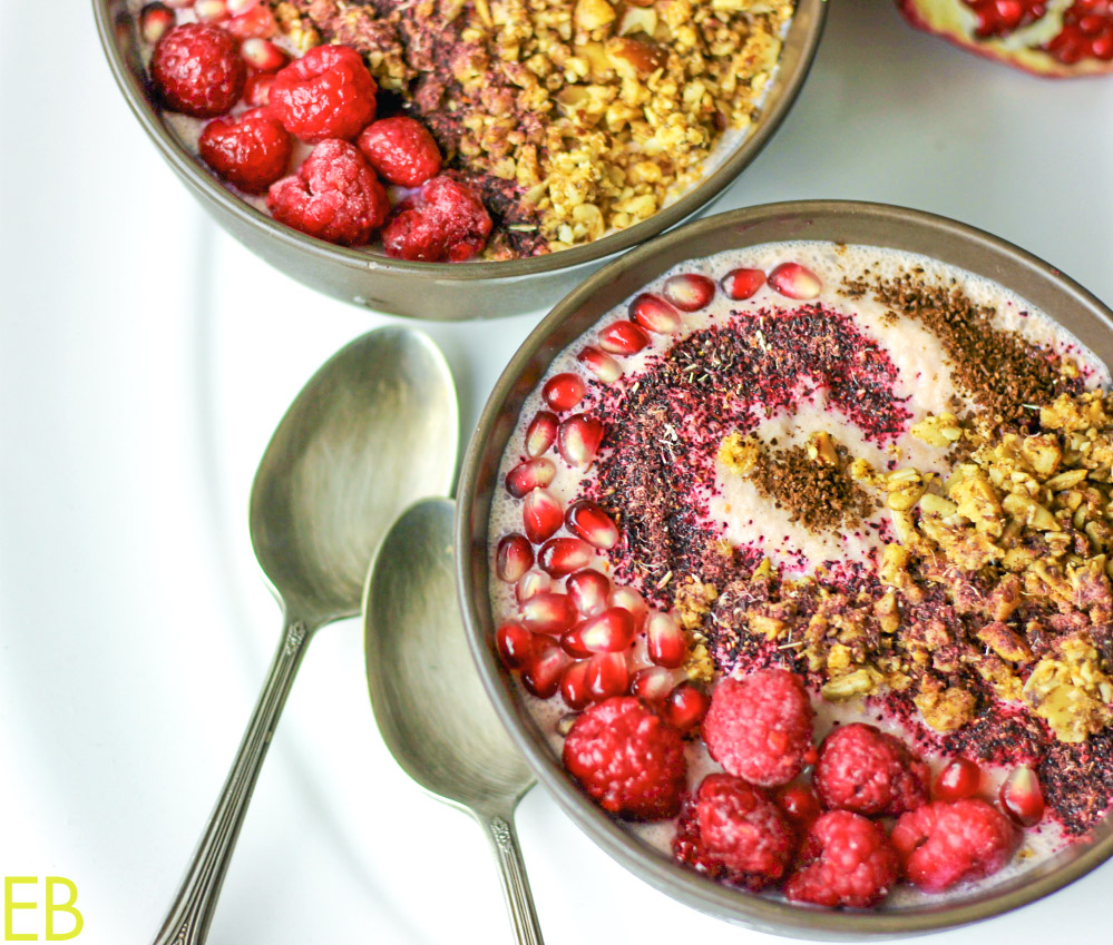 overhead view of pomegranate smoothie bowls