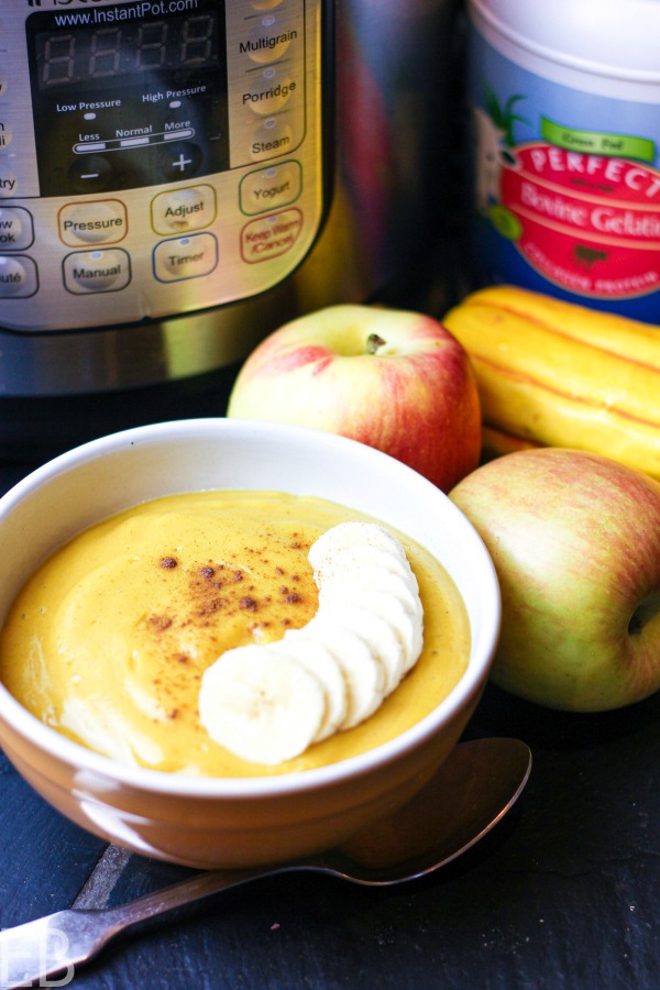 bowl of instant pot apple squash porridge with IP behind