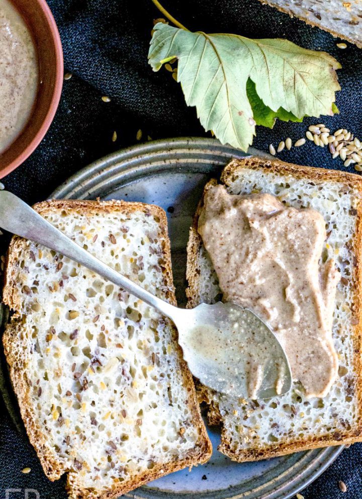 seed butter on bread with seeds around