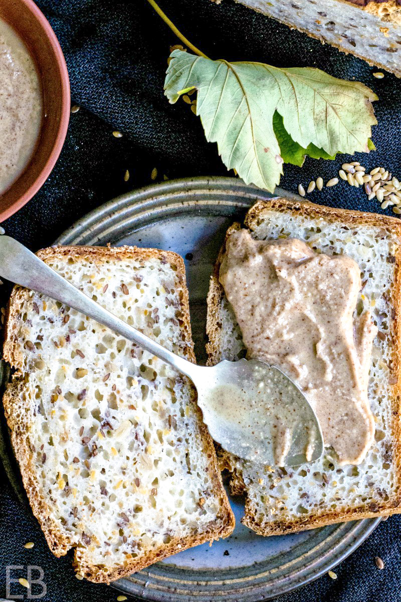 seed butter on bread with seeds around