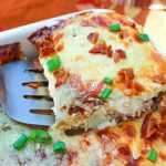 Delicious!! ~ Cauliflower-Chicken Au Gratin Casserole with Bacon is Keto, Low-Carb, Primal (Paleo + dairy), and GAPS diet-friendly. It's comfort food, and it can be made ahead of time. #keto #lowcarb #gapsdiet #paleo #primal #chicken #cauliflower #bacon #cheese #casserole #makeahead #augratin #onedish #dinner #comfortfood