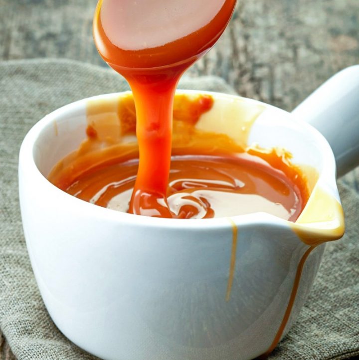 pouring caramel from spoon