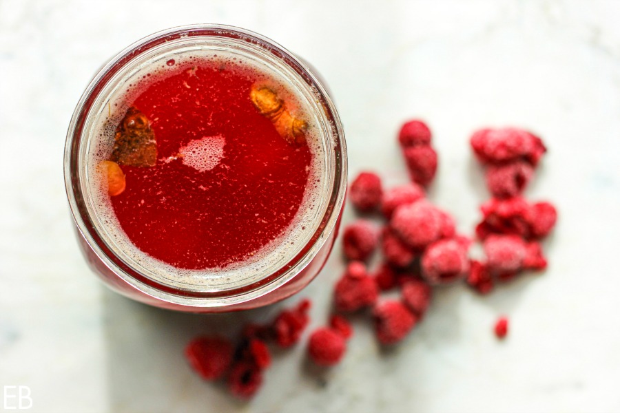 overhead view of beet kvass in jar