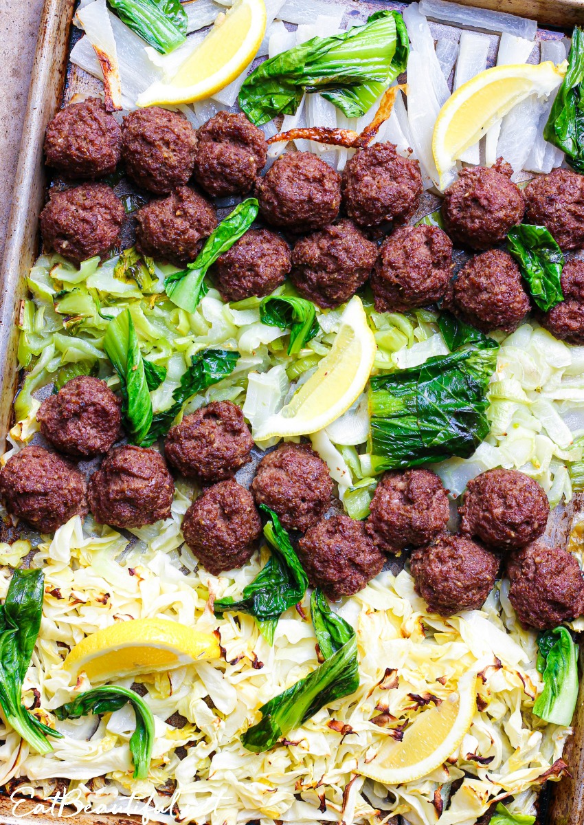 overhead view of asian meatballs dinner on sheet pan