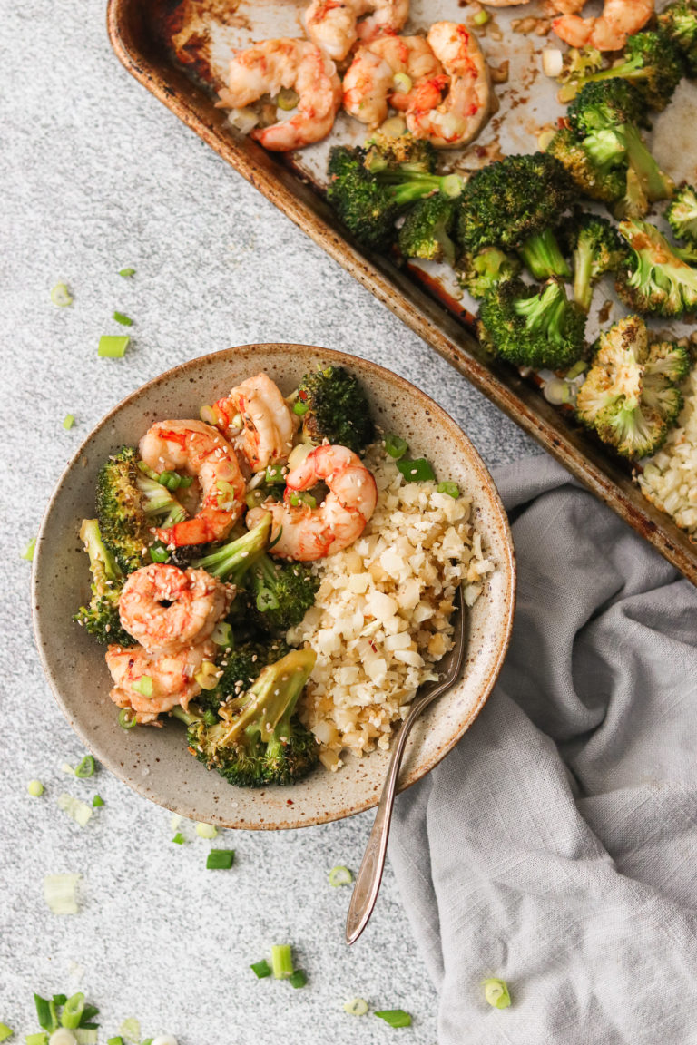 dish and pan with shrimp, broccoli and cauliflower rice