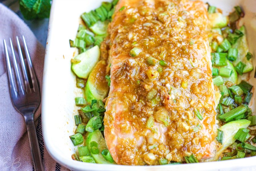 looking from the side end of the salmon fillet of ginger-lime salmon in casserole dish