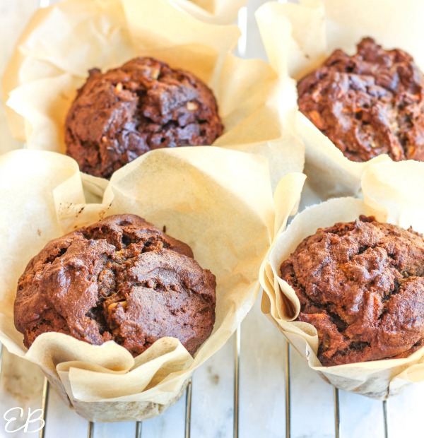 4 muffins cooling on rack