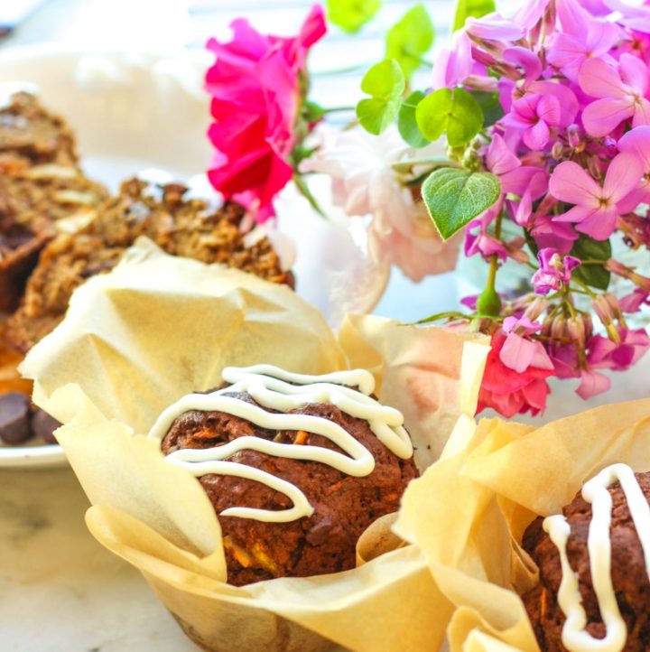 keto morning glory muffins in sunny window with flowers