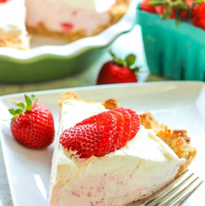 one slice of keto strawberry cream pie on a white plate
