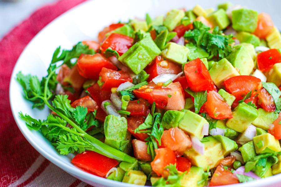 pico de gallo with avocado in white dish