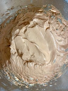 overhead view of finished chocolate cream cheese frosting