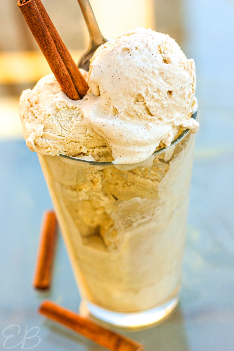 looking down at an angle at a tall glass filled to heaping with paleo cinnamon ice cream