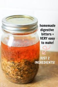 a jar of homemade bitters for stomach aches