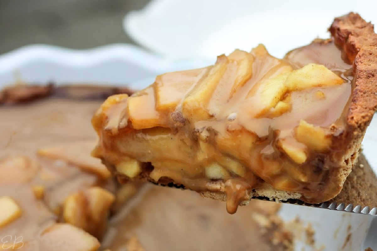 paleo aip caramel apple pie being lifted up to serve