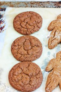 3 round cookies on cookie sheet