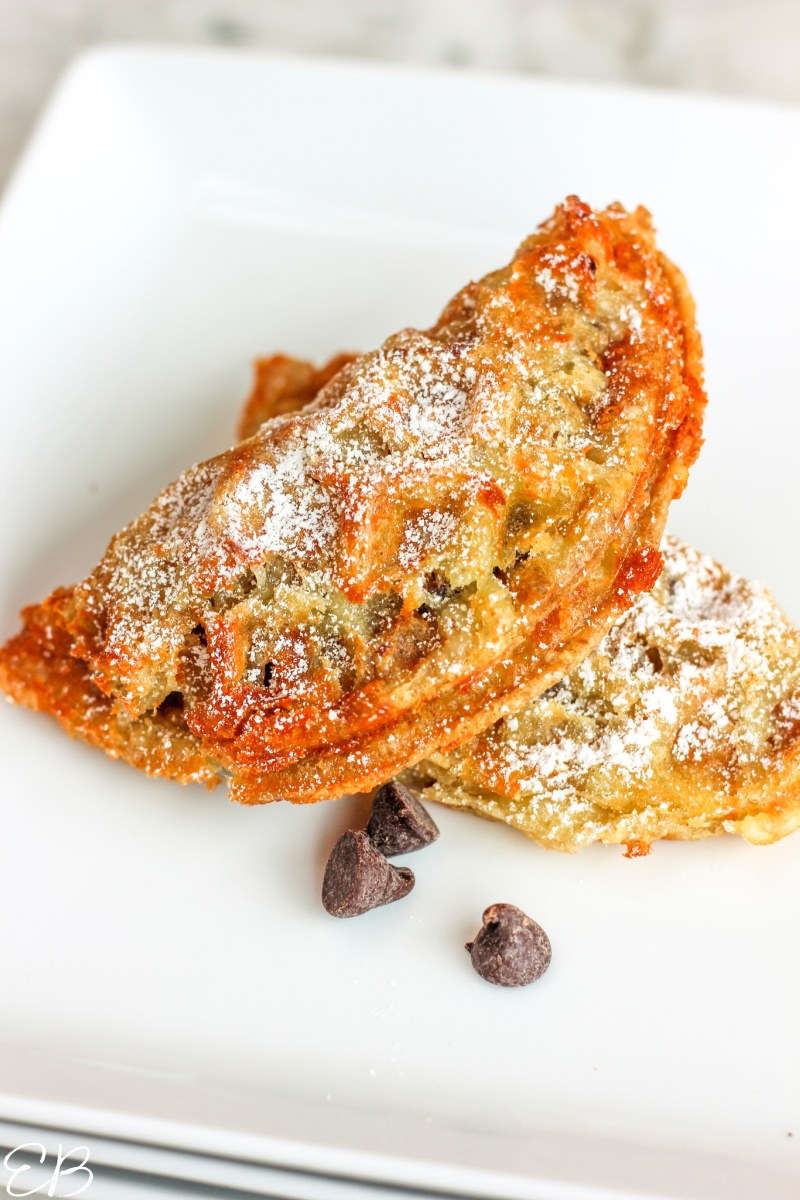 two keto chocolate croissant chaffles served on a white plate