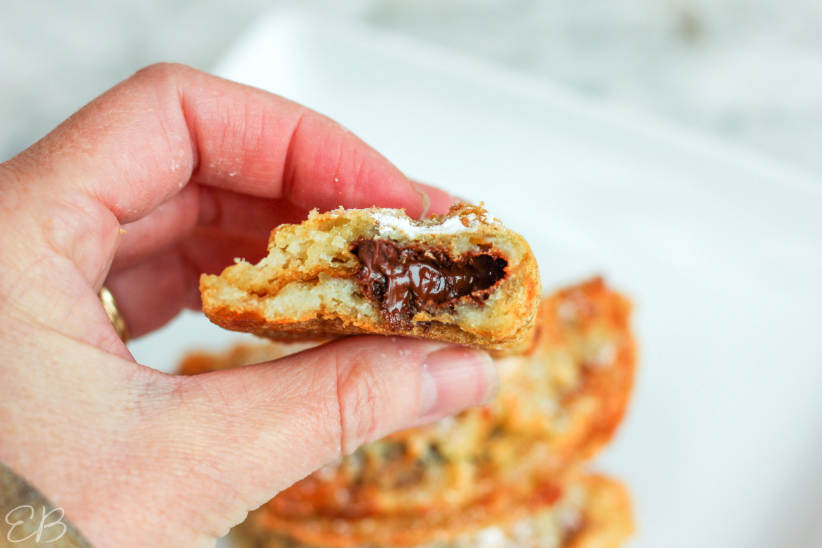 looking inside a cut open chocolate croissant chaffle