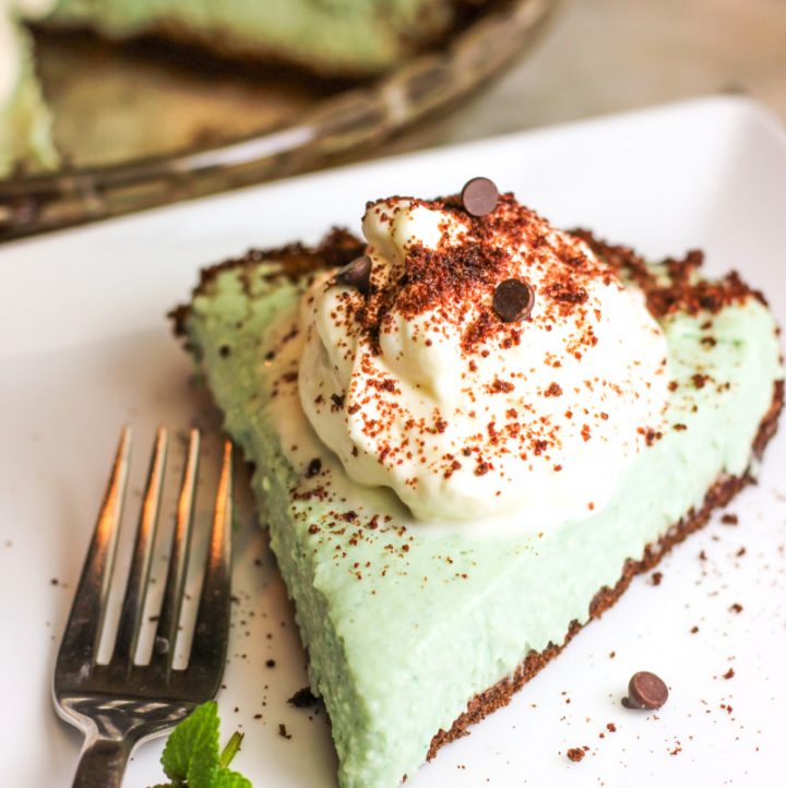one slice of grasshopper pie on a plate with a fork