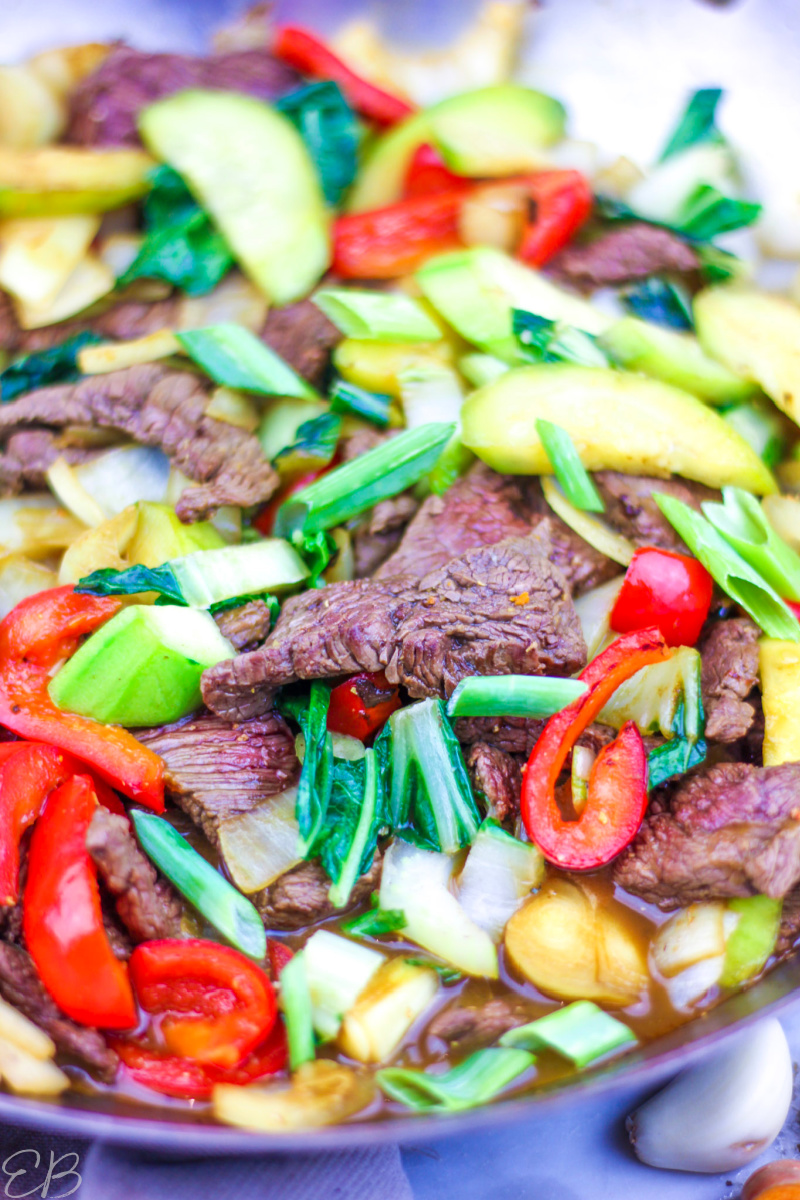 up close view of paleo beef stir fry with steak slices and lots of veggies