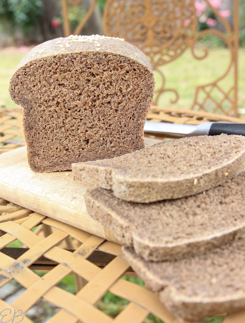 loaf of oat bread on cutting board