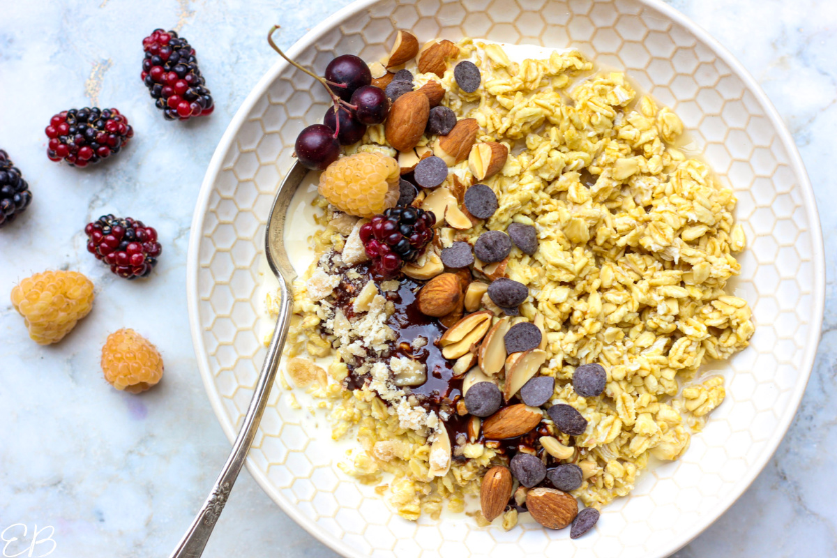 overhead view of a bowl of overnight oats with toppings