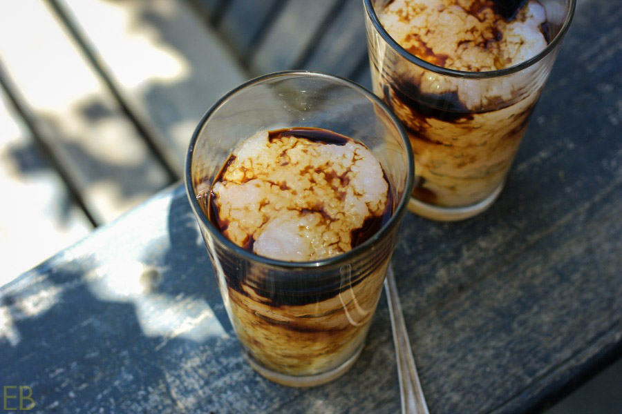 overhead view of tapioca floats with black or herbal black coffee poured over