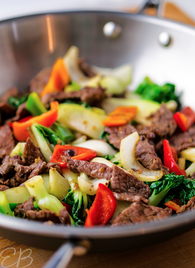 a wok with steak stir fry