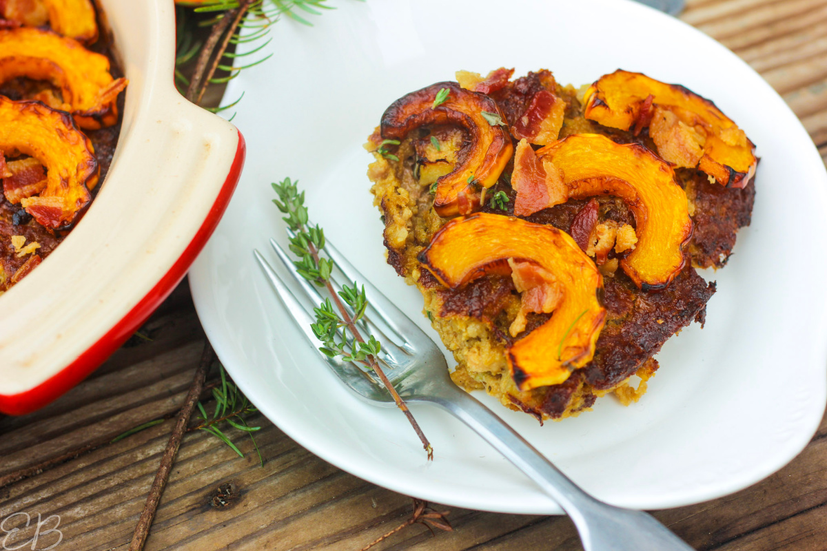 one piece of AIP Apple, Pork and Bacon BREAKFAST CASSEROLE with Delicata Squash served on a small white plate