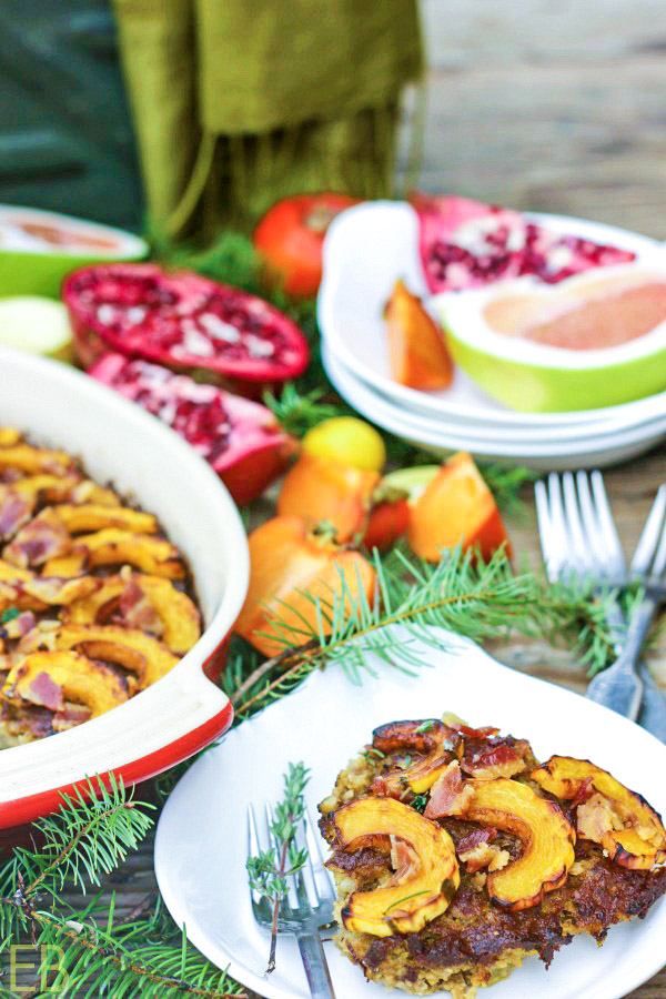 one piece of aip breakfast casserole surrounded by fruits