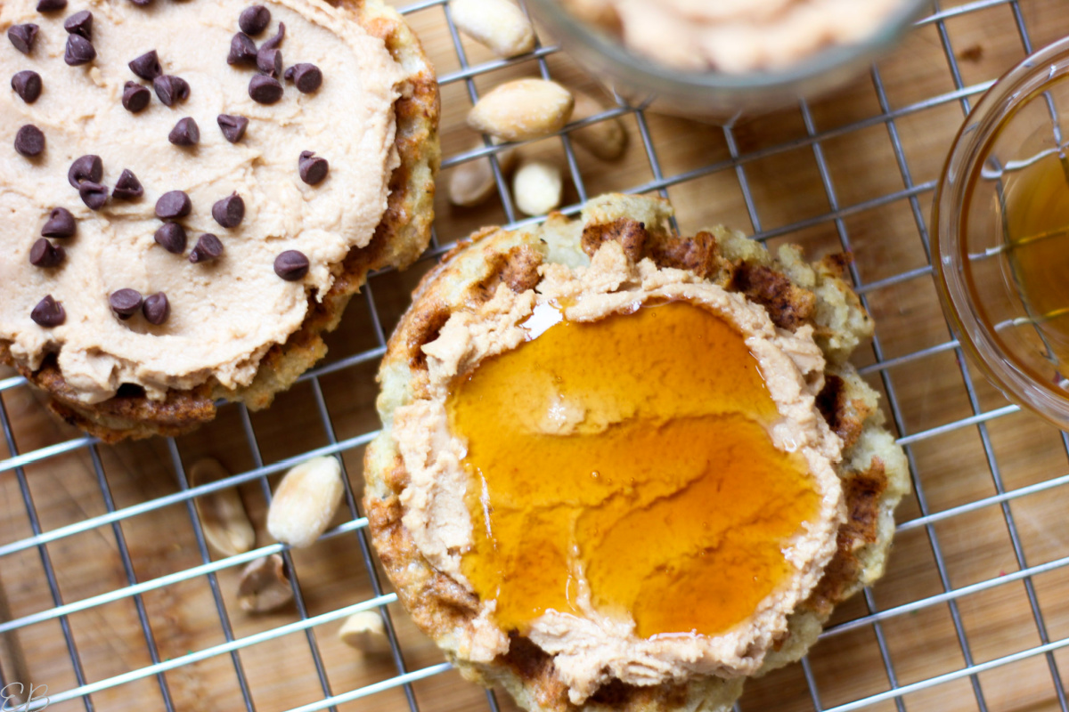 overhead view of honey and fermented peanut butter on waffle