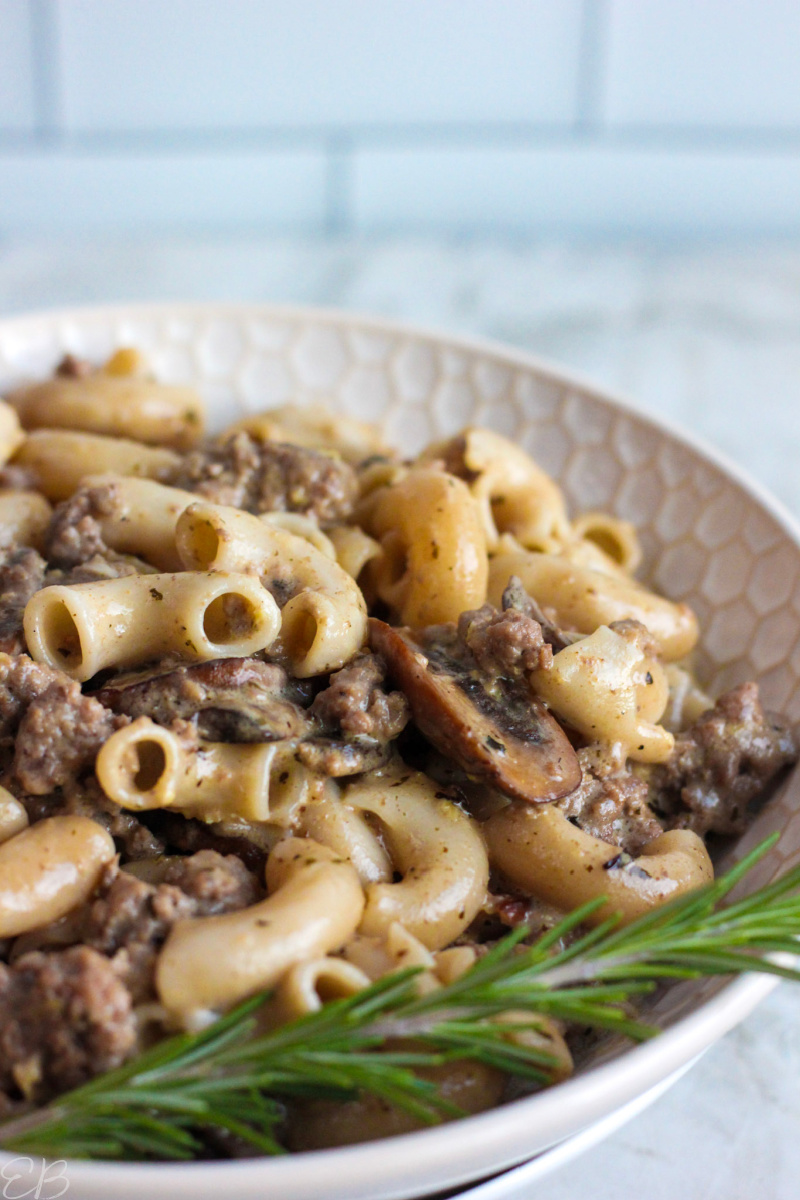 side angle view of paleo aip hamburger macaroni dished up in white bowl