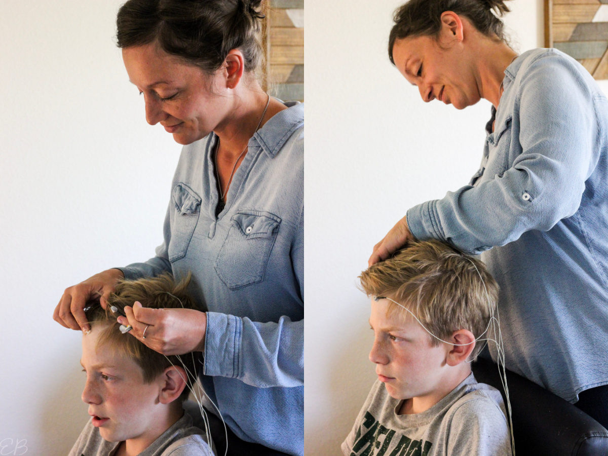 Erin Wolff putting electrodes for EEG on patient's scalp