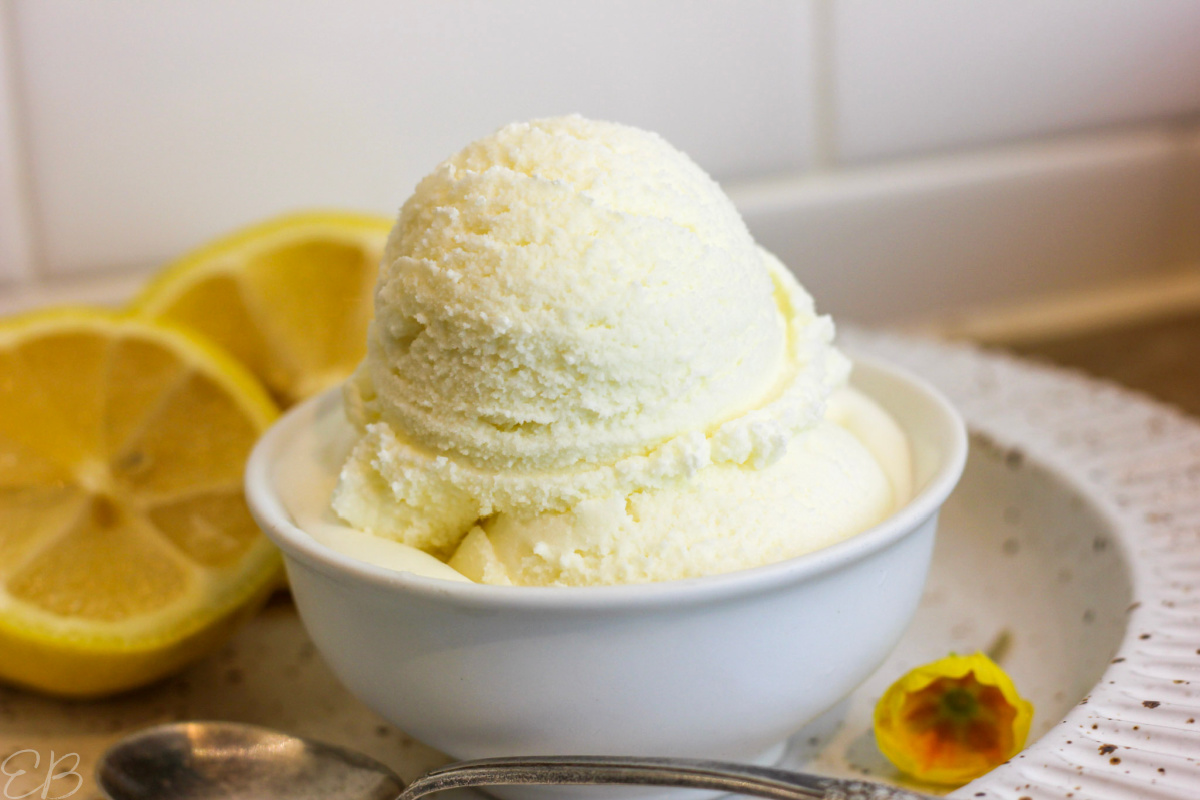 heaping scoops of lemon ice cream in white dish