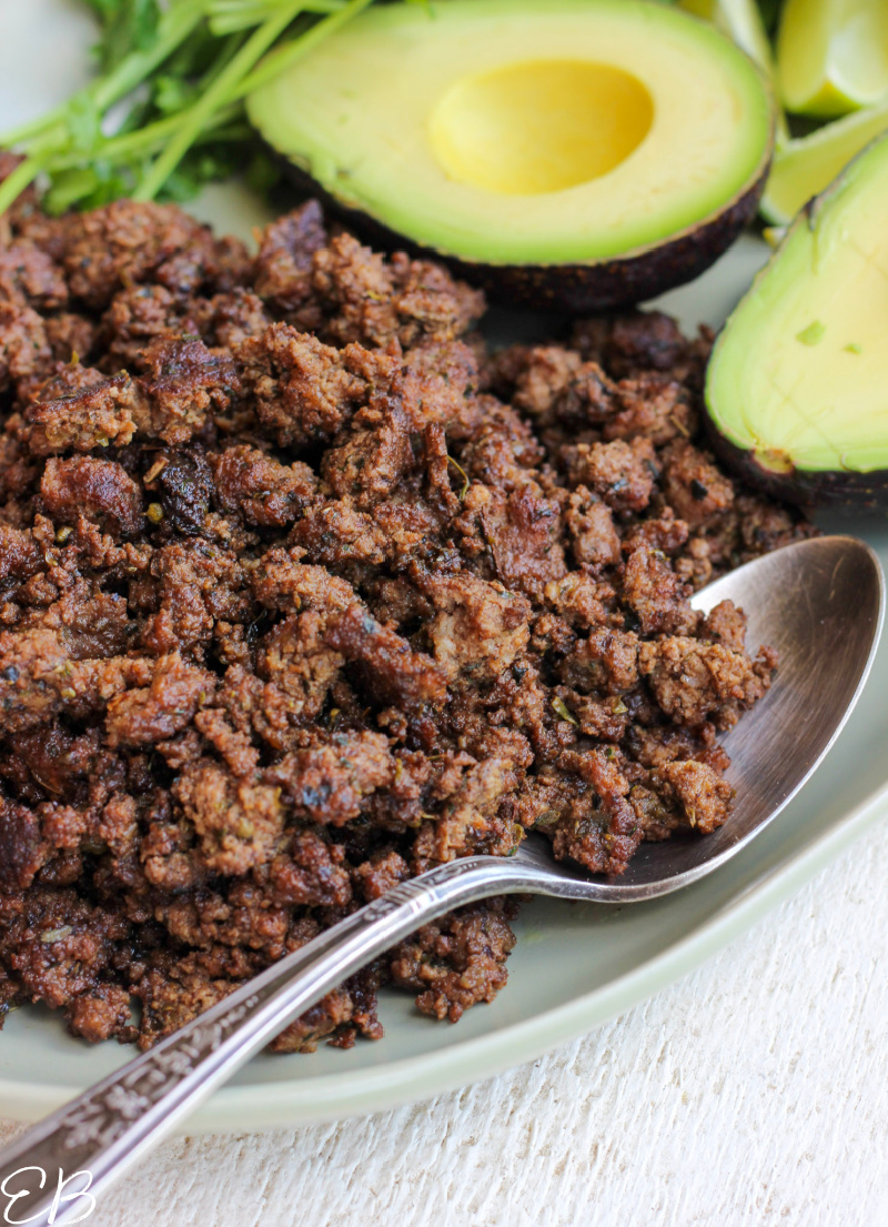 spoon scooping up nightshade-free seasoned beef to serve