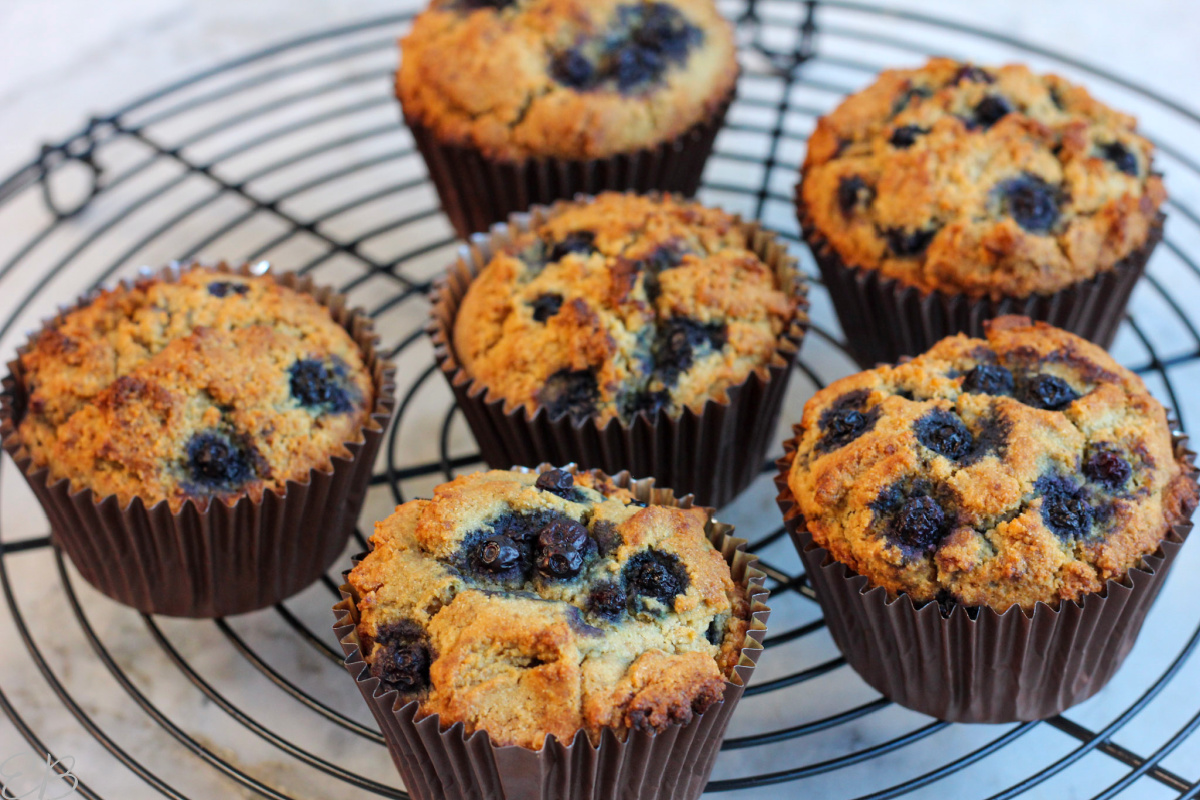 all 6 muffins cooling on rack