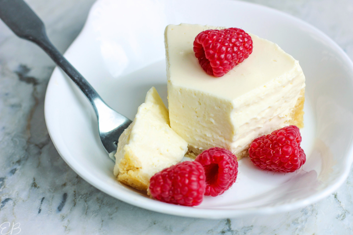 one slice of cheesecake on white plate