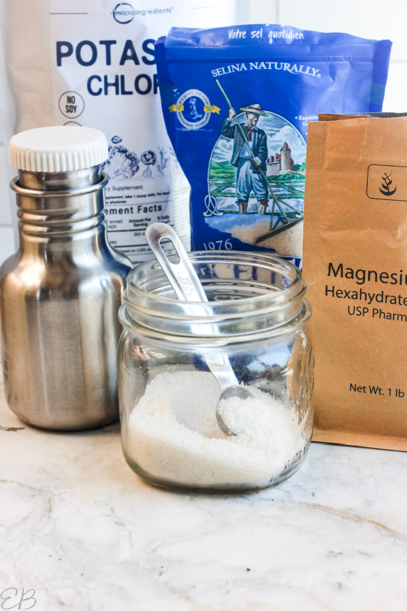 bulk homemade electrolyte powder in a jar with teaspoon