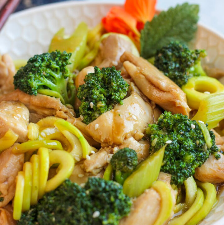 up close view of chicken stir fry in dish