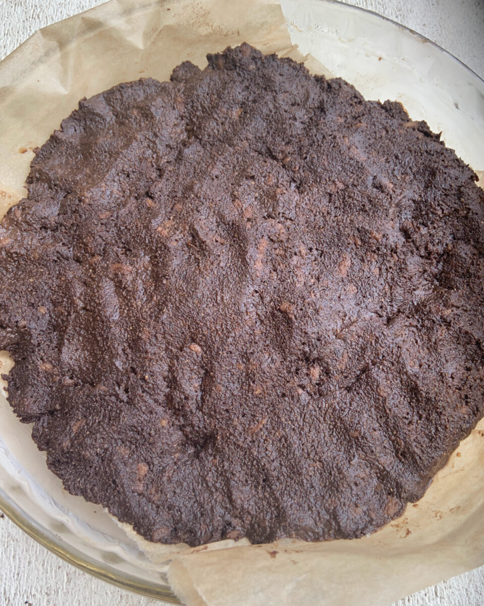 thick paleo aip brownie batter patted into baking dish