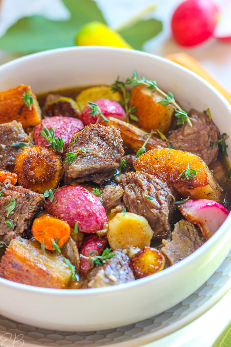 up close photo of middle eastern beef stew with za'atar in white bowl