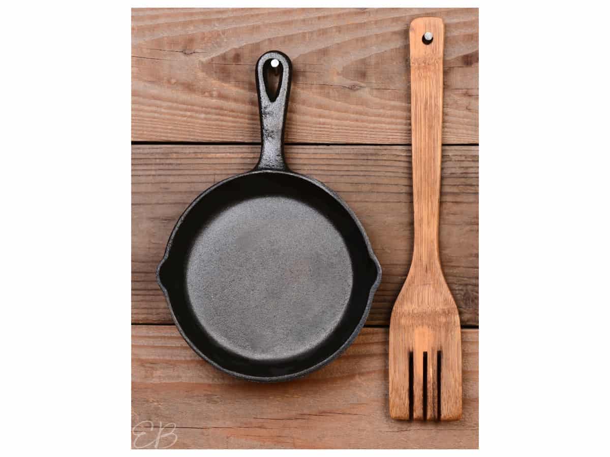 cast iron pan hanging on wall