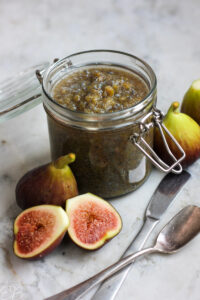 fresh figs and jar of fig jam