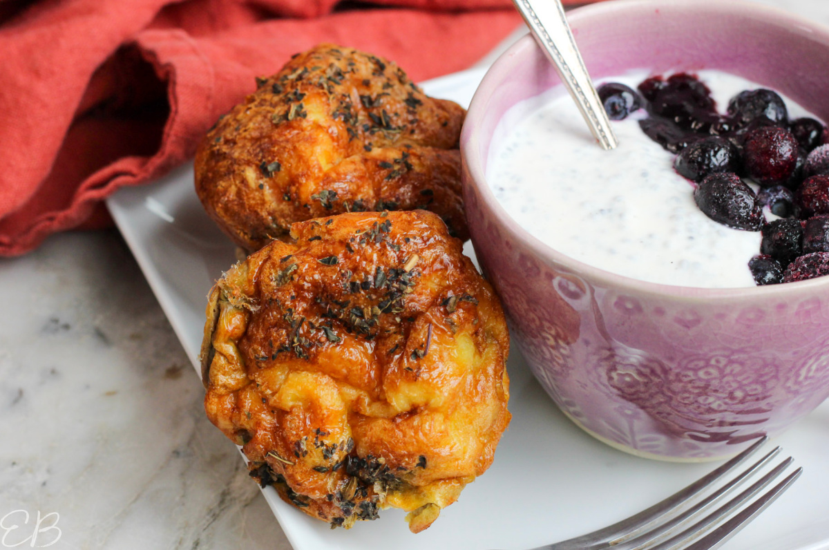 2 Low FODMAP Meat and Egg Muffins served with basil seed yogurt pudding and blueberries