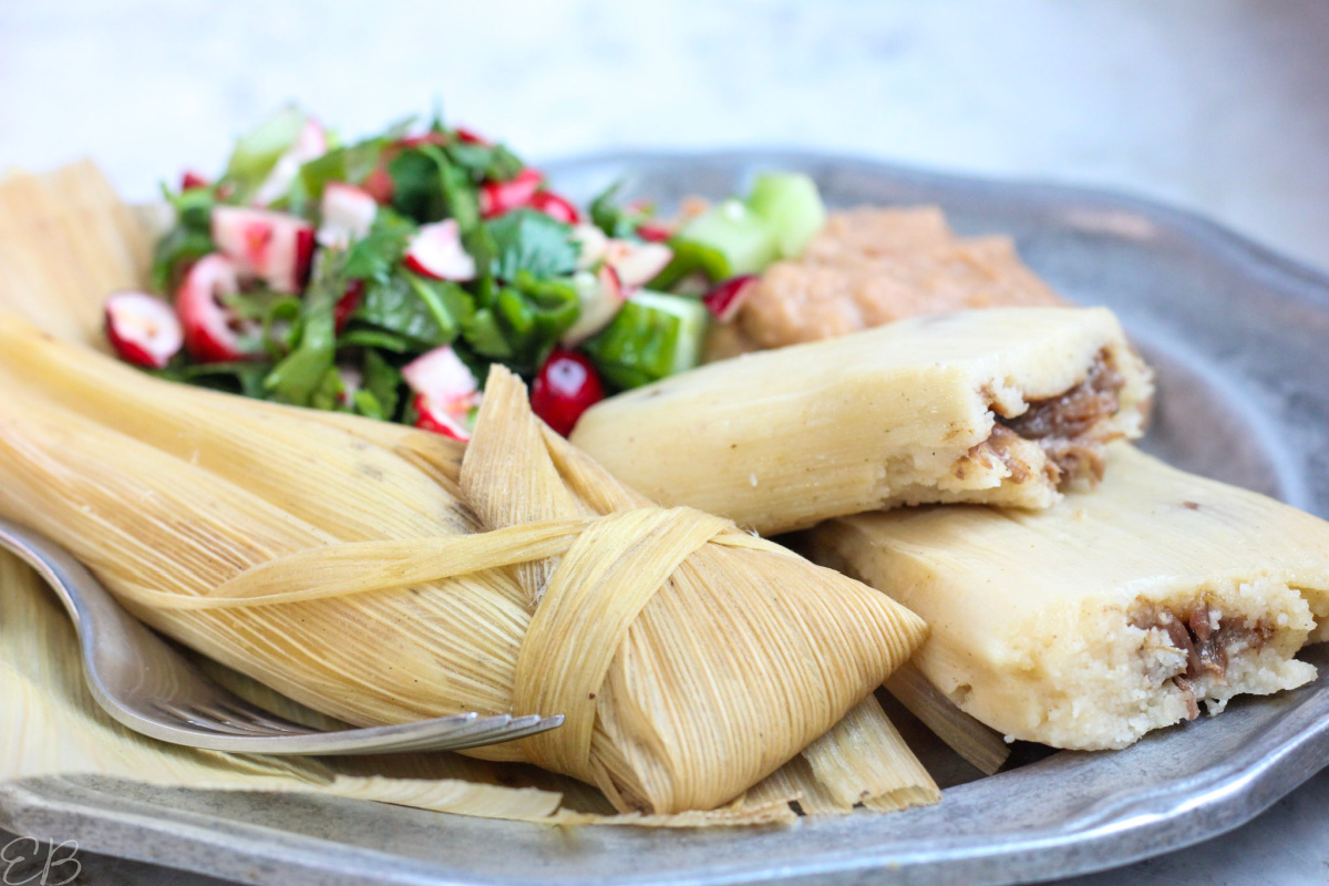 nightshade-free-tamales-gluten-free on pewter plate with salsa and beans