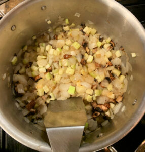 sauteing zucchini, mushrooms and parsnips process photo