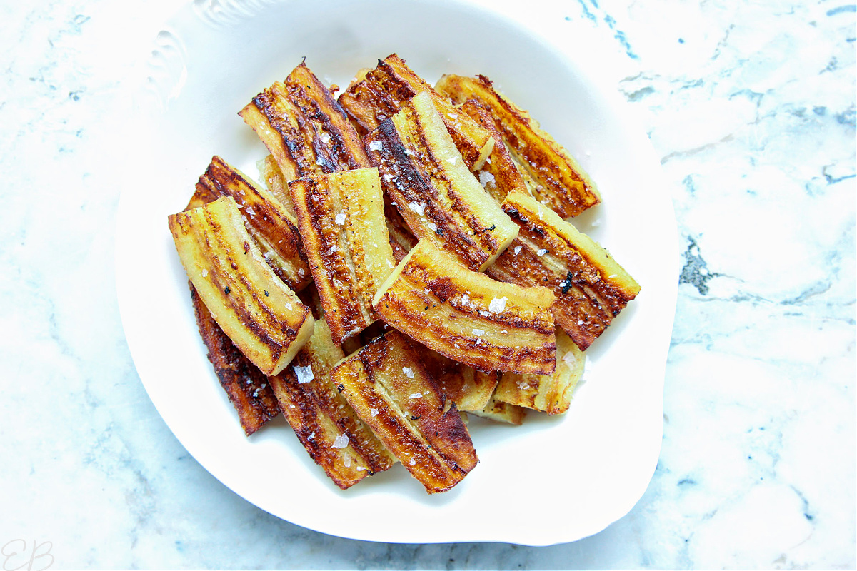 overhead view of Green Banana Fries on white plate