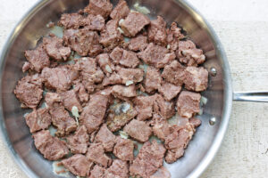overhead view of stew meat before frying